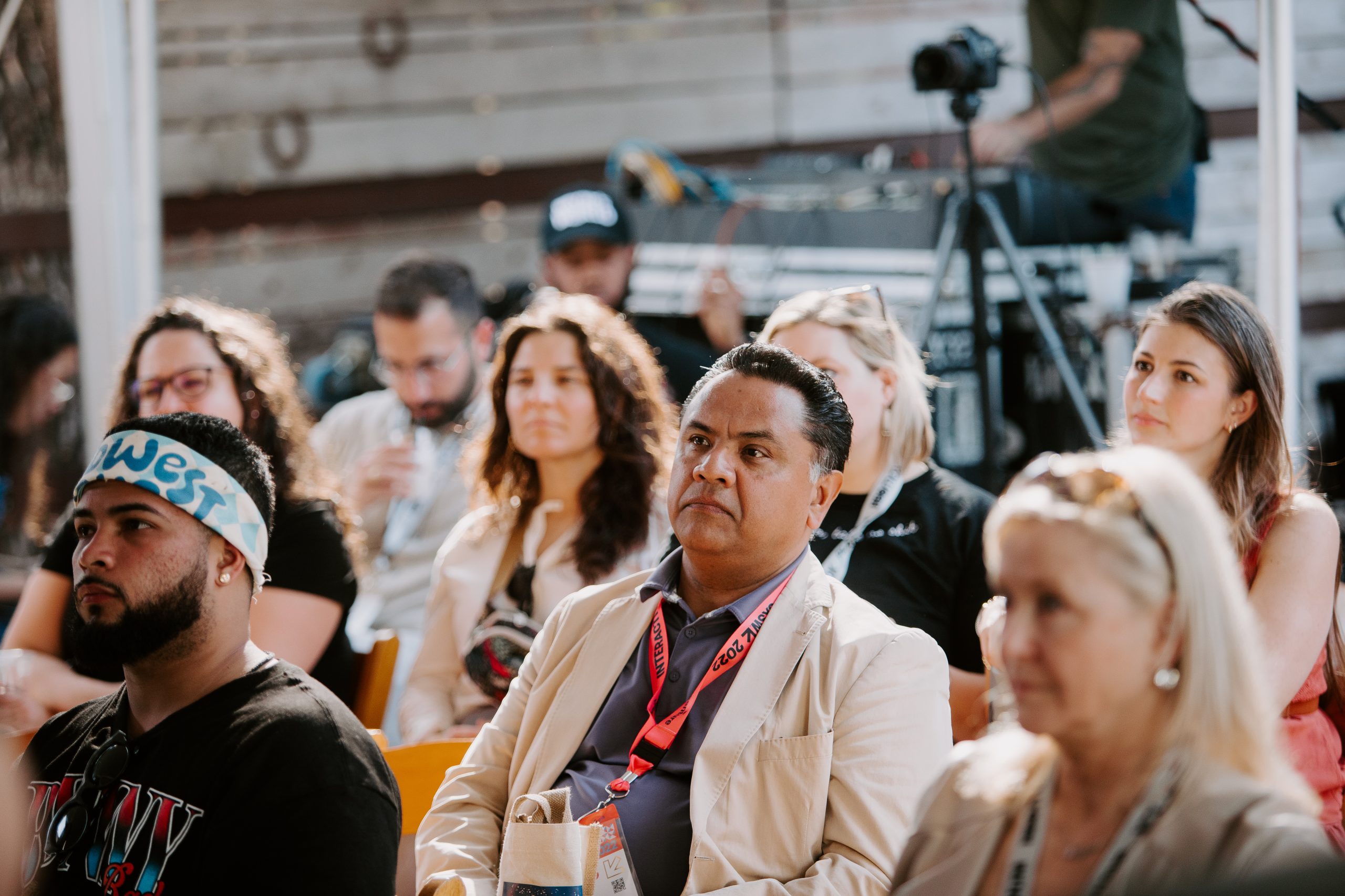 The audience for the panel discussion on the topic of ingredients for impactful innovation at SxSW watches the discussion intently.